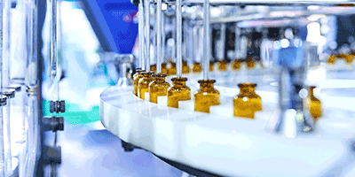 vials on conveyor belt