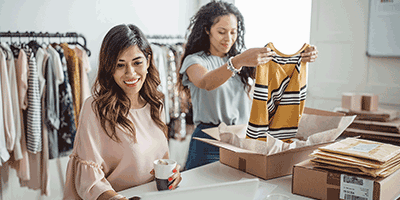 women packaging clothing