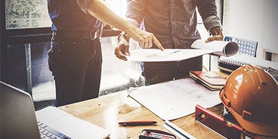 men working at desk