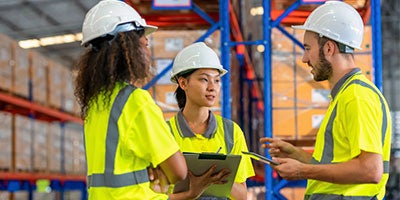 Warehouse workers chatting