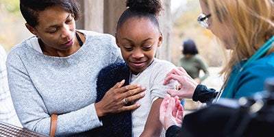 child getting vaccinated