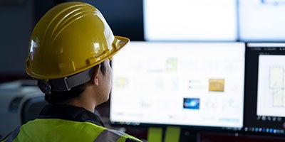 industrial worker using computer