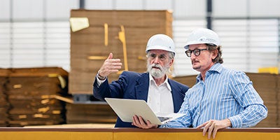 industrial workers chatting