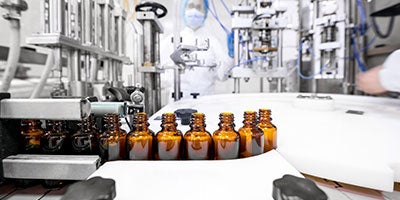vials on conveyor belt