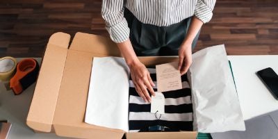 person packaging gift