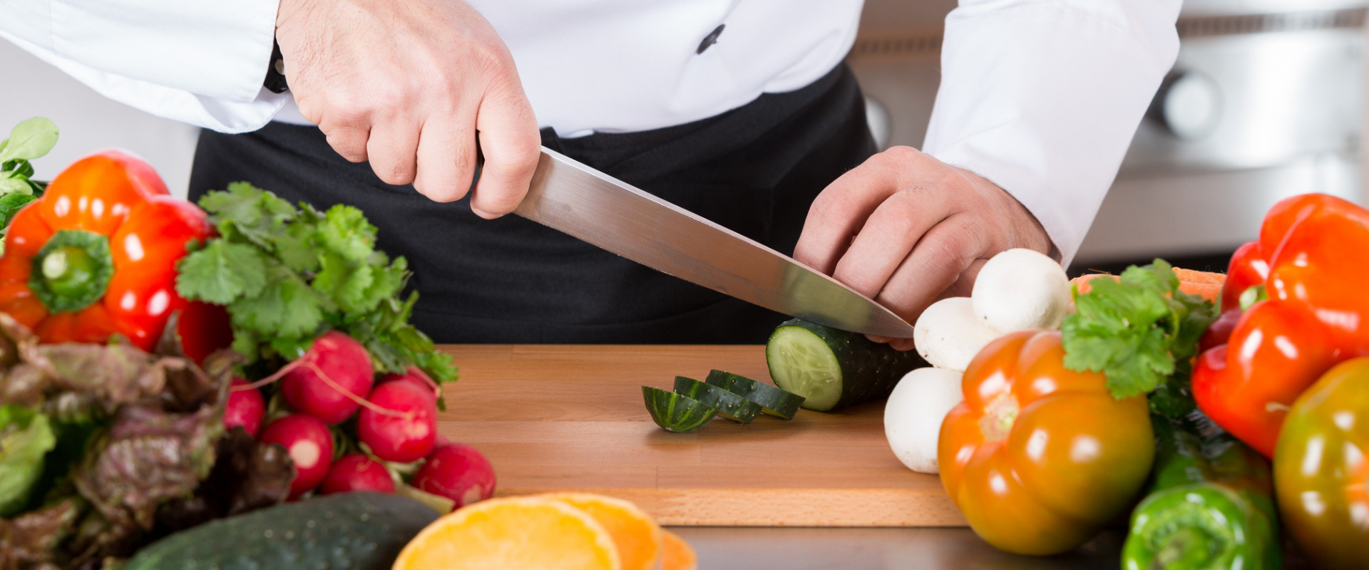 person chopping vegetables