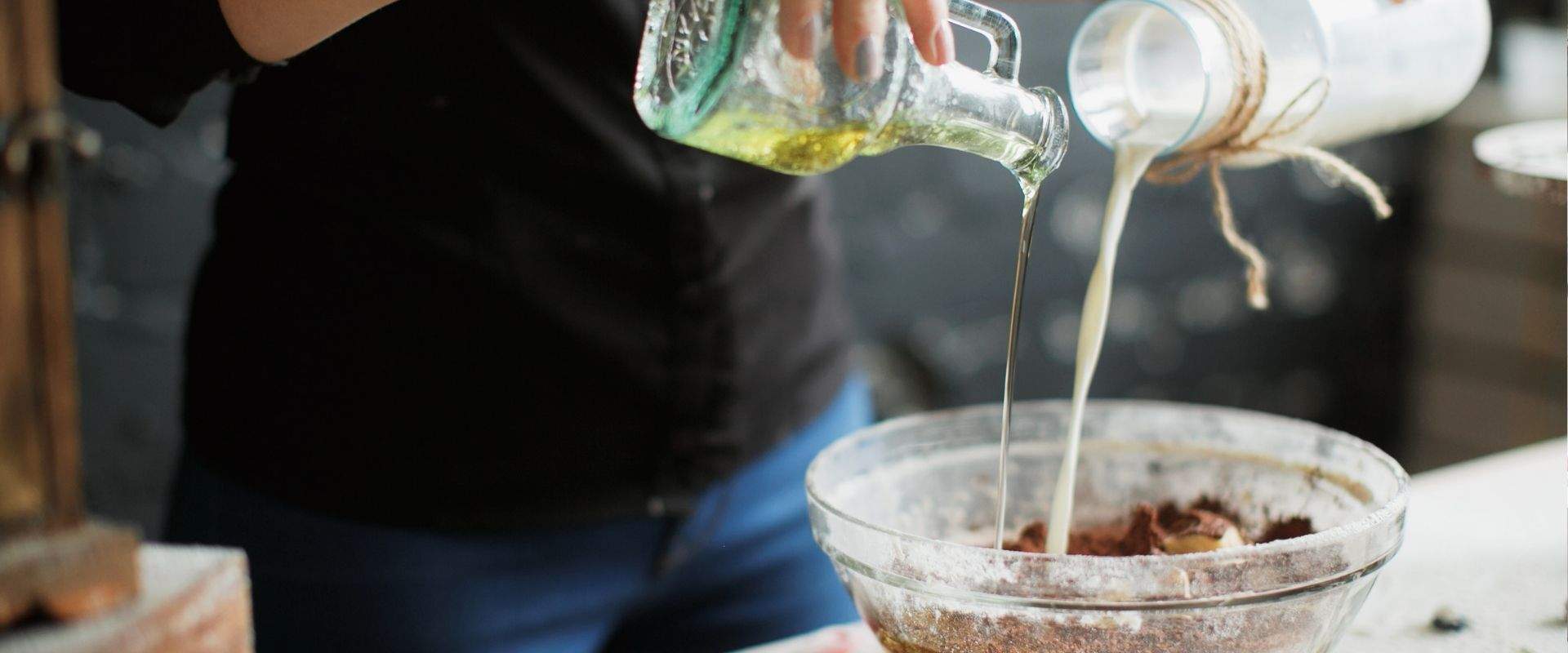 food ingredients pour into a mixing bowl