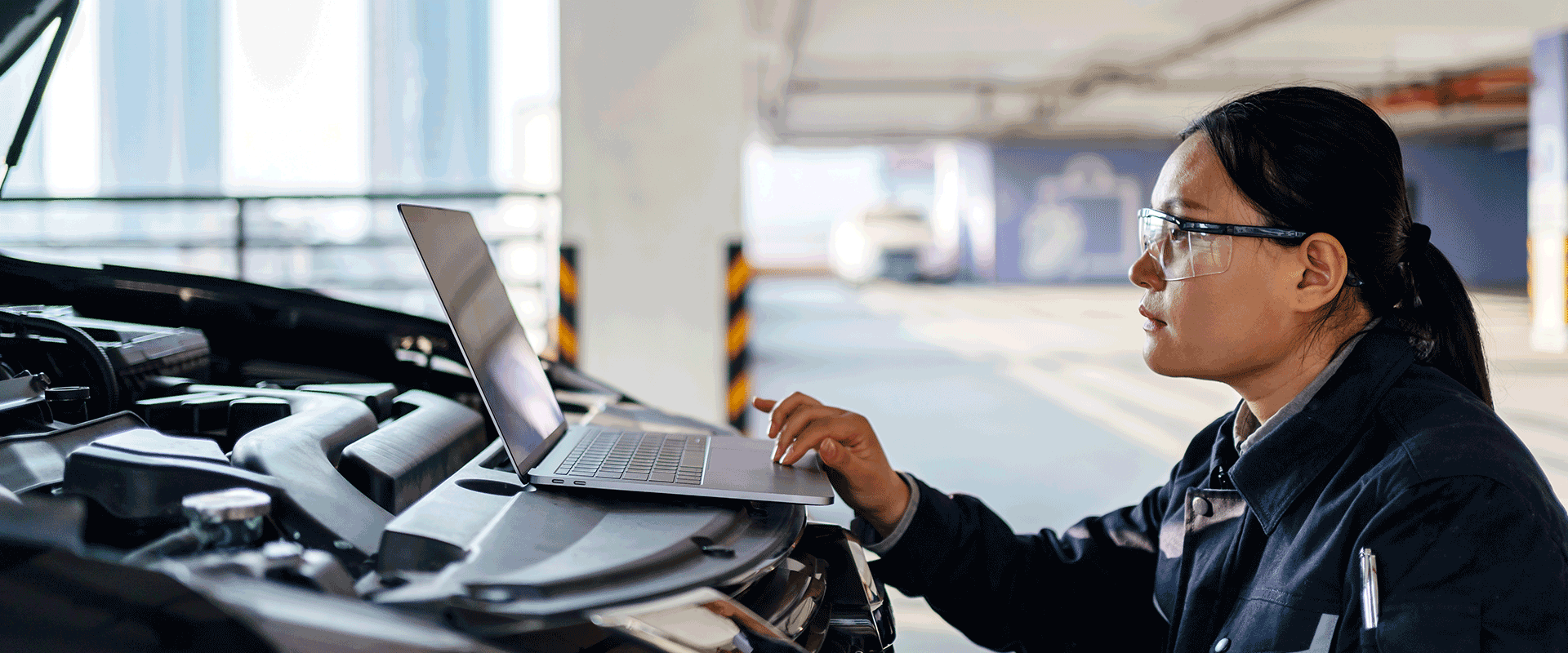 auto repair woman computer