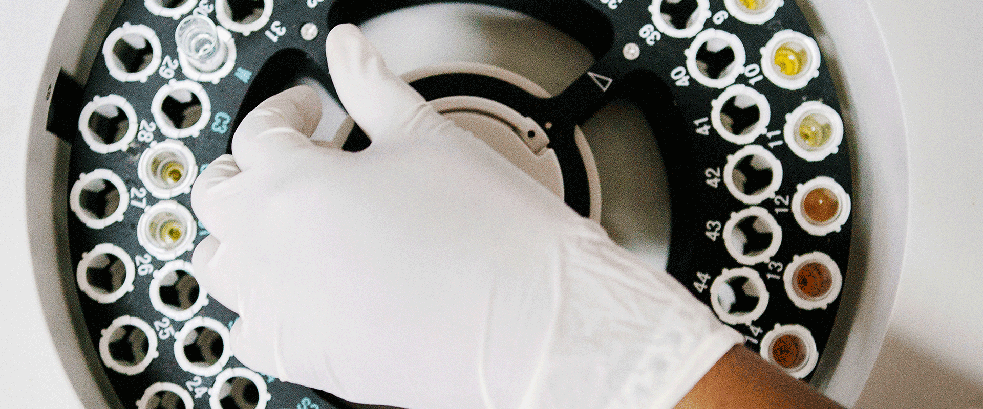 hand on centrifuge