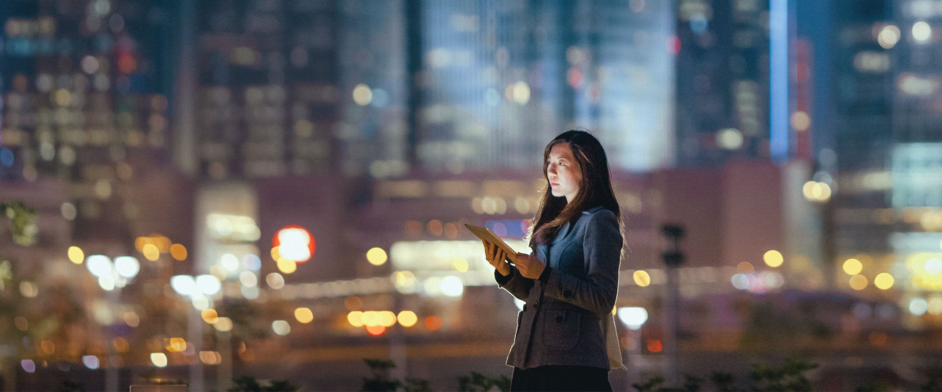 businesswoman in front of skyline