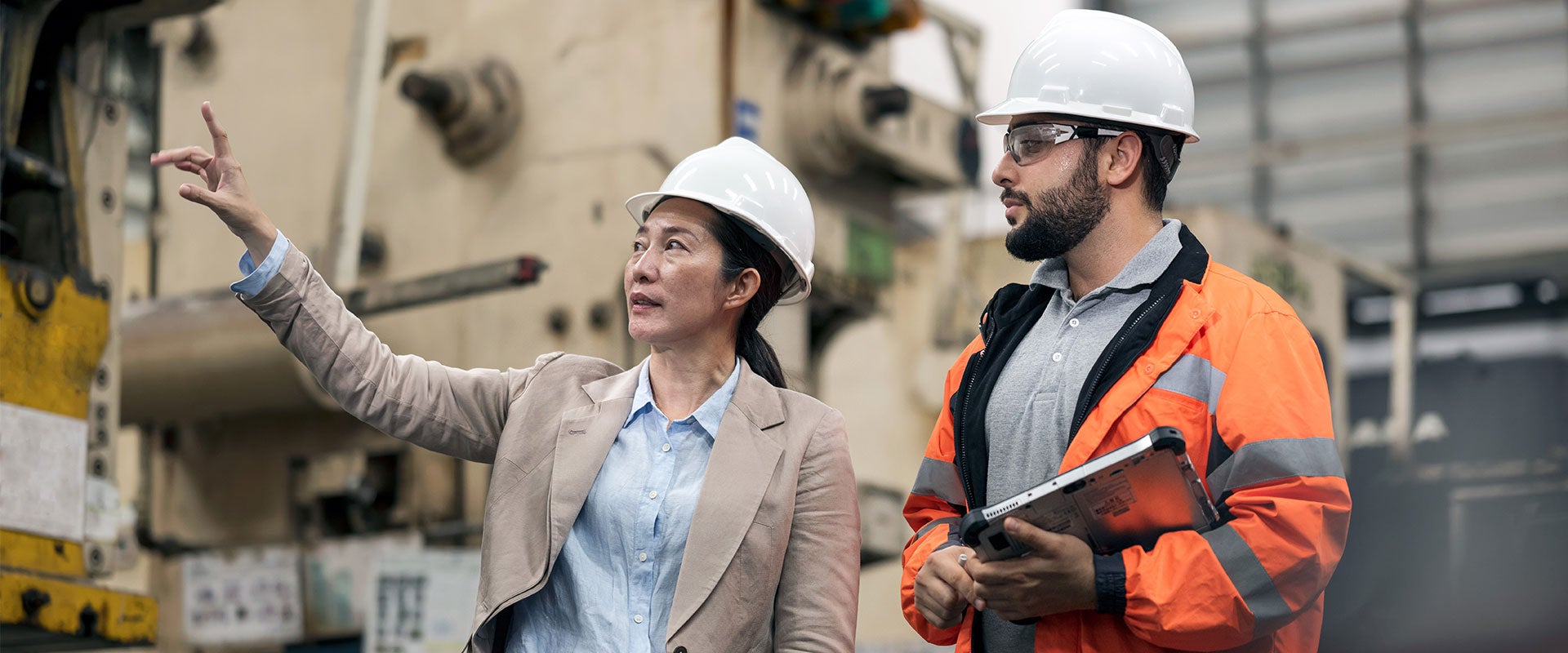 people surveying building