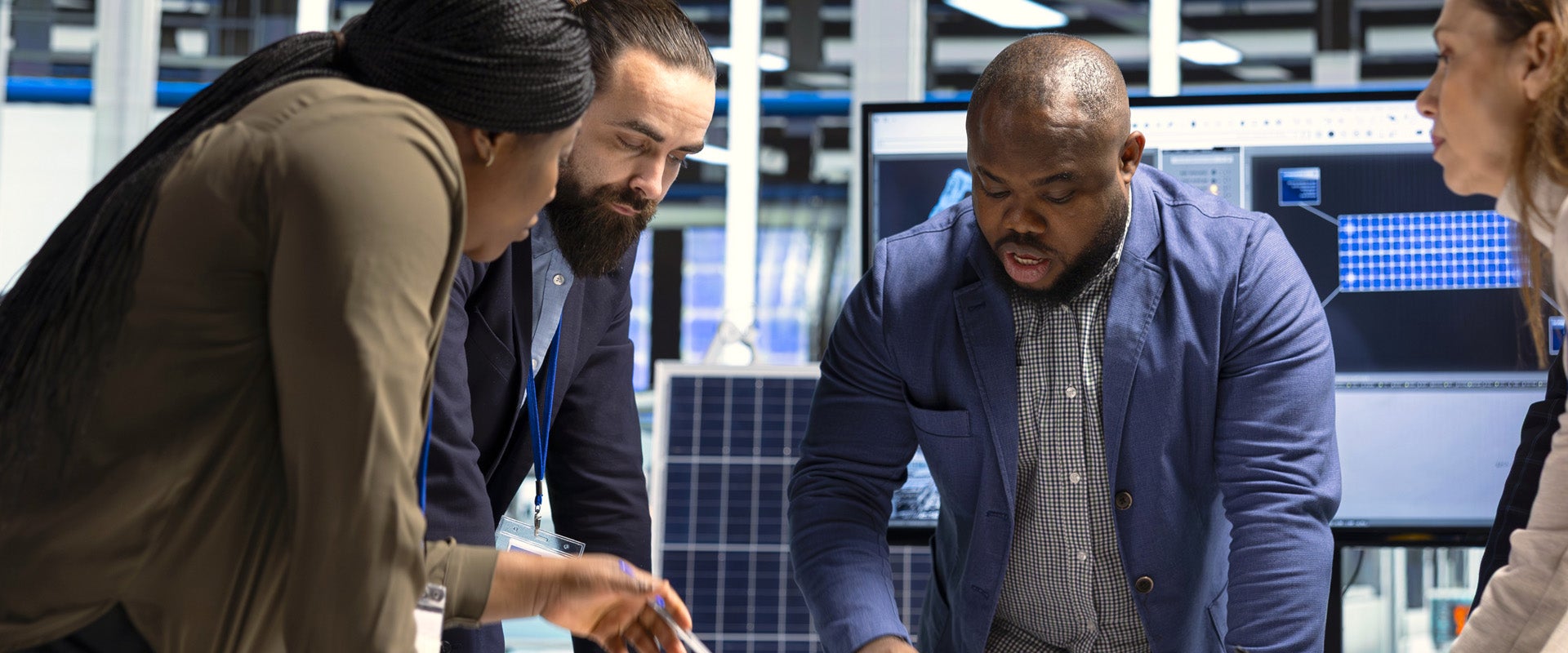 People discussing manufacturing plans 