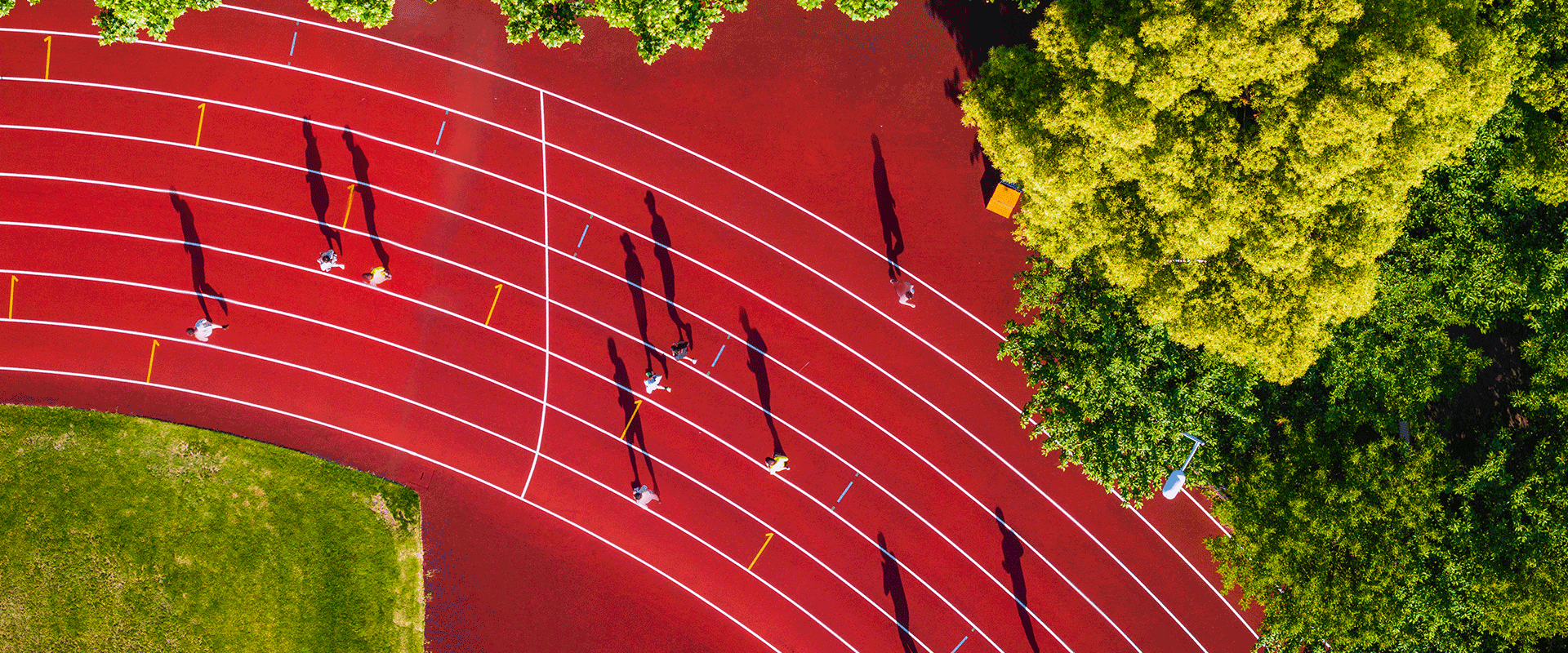 people running on track outdoors