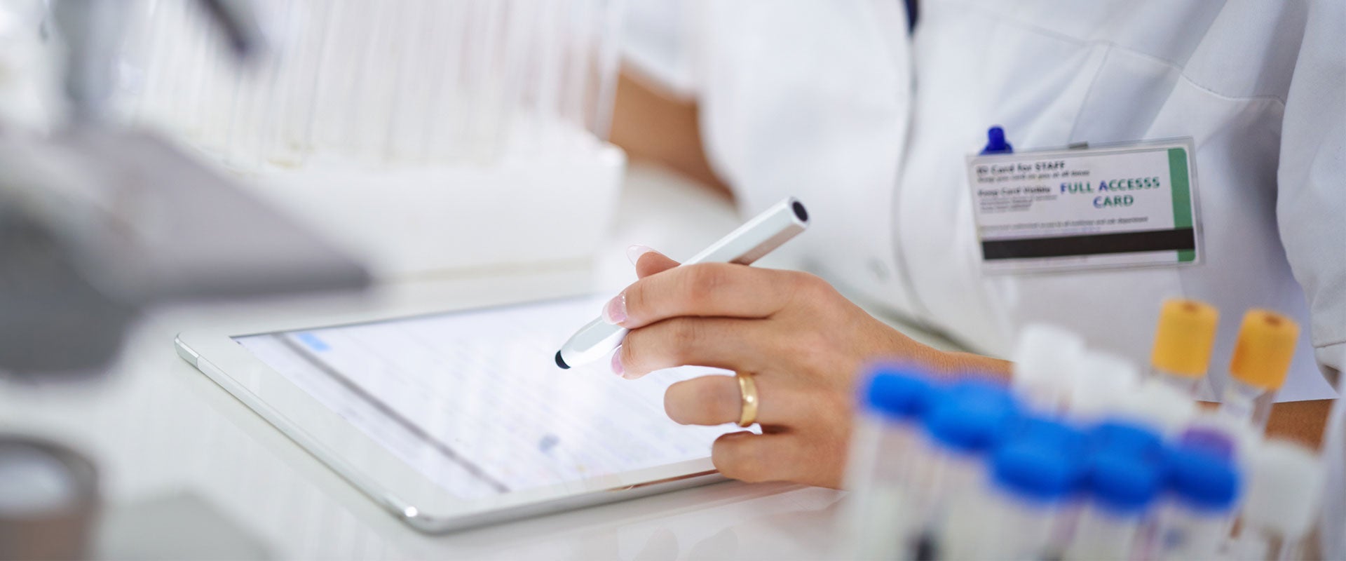 researcher working on tablet
