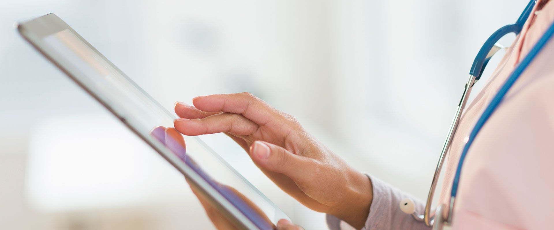 nurse using tablet