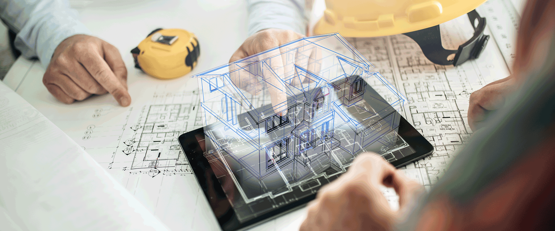 builders reviewing architectural blueprints