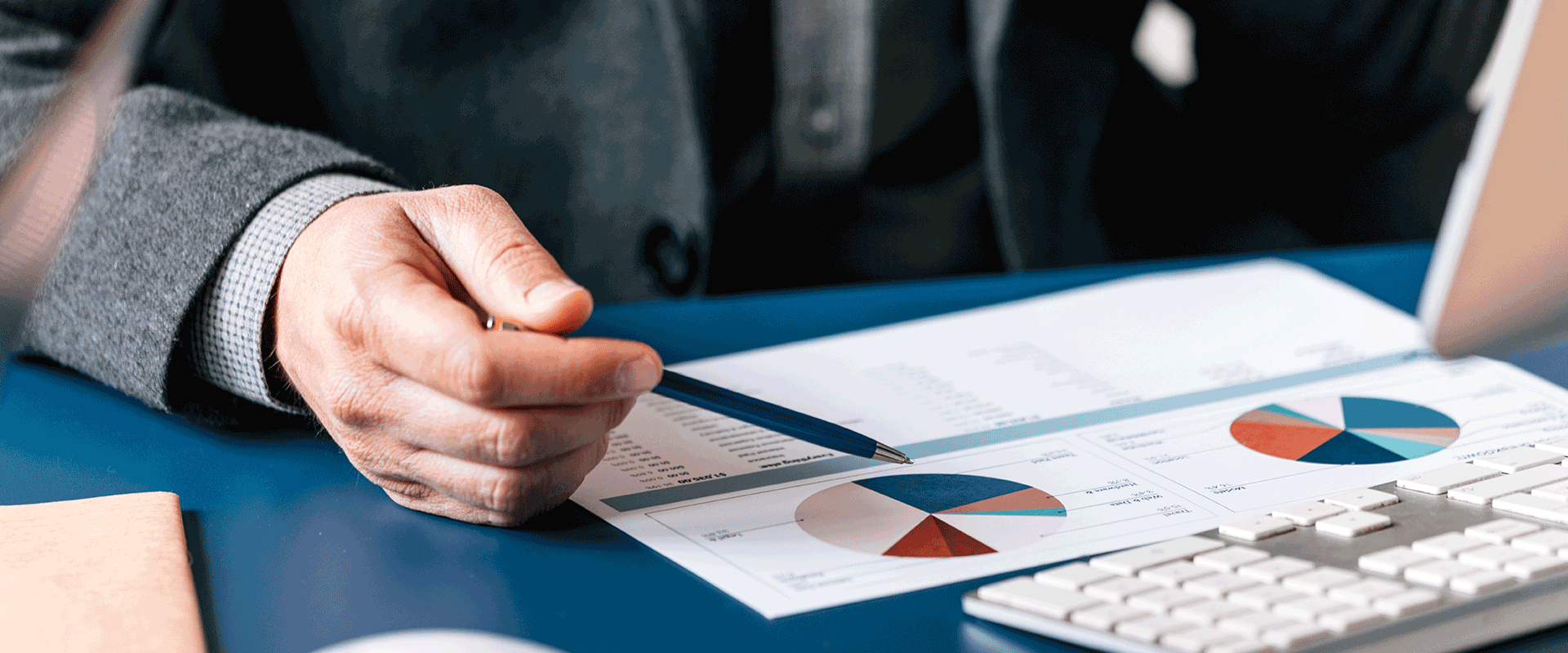 person reviewing data on paper