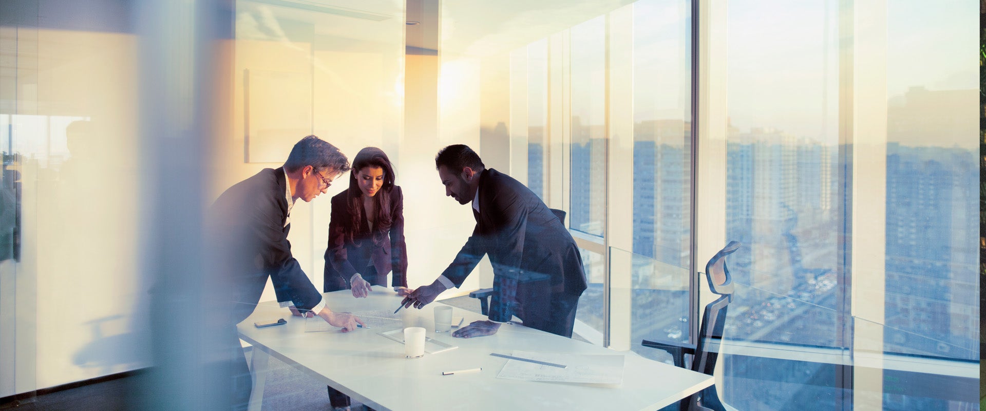 three executives creating a strategic plan