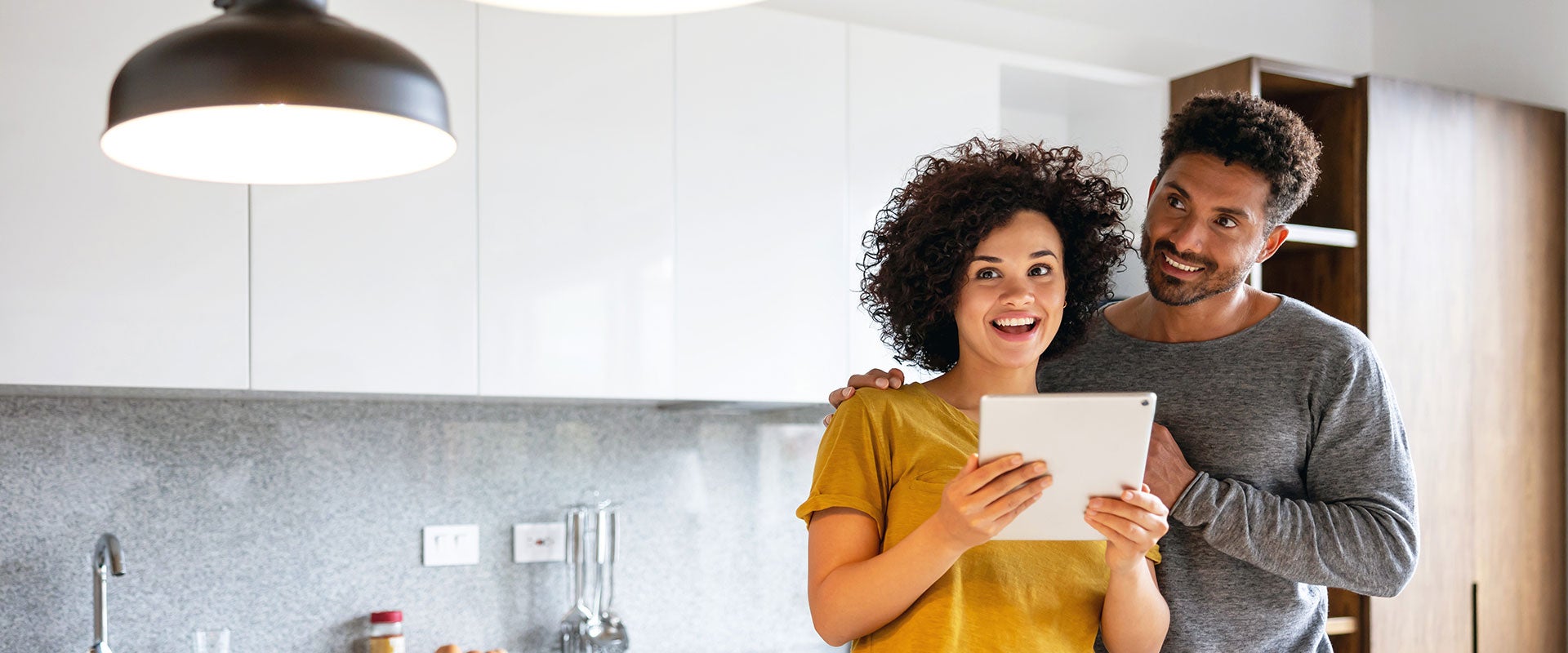 couple smiling at lamp