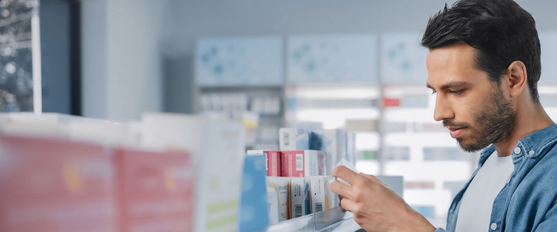 man shopping in pharmacy