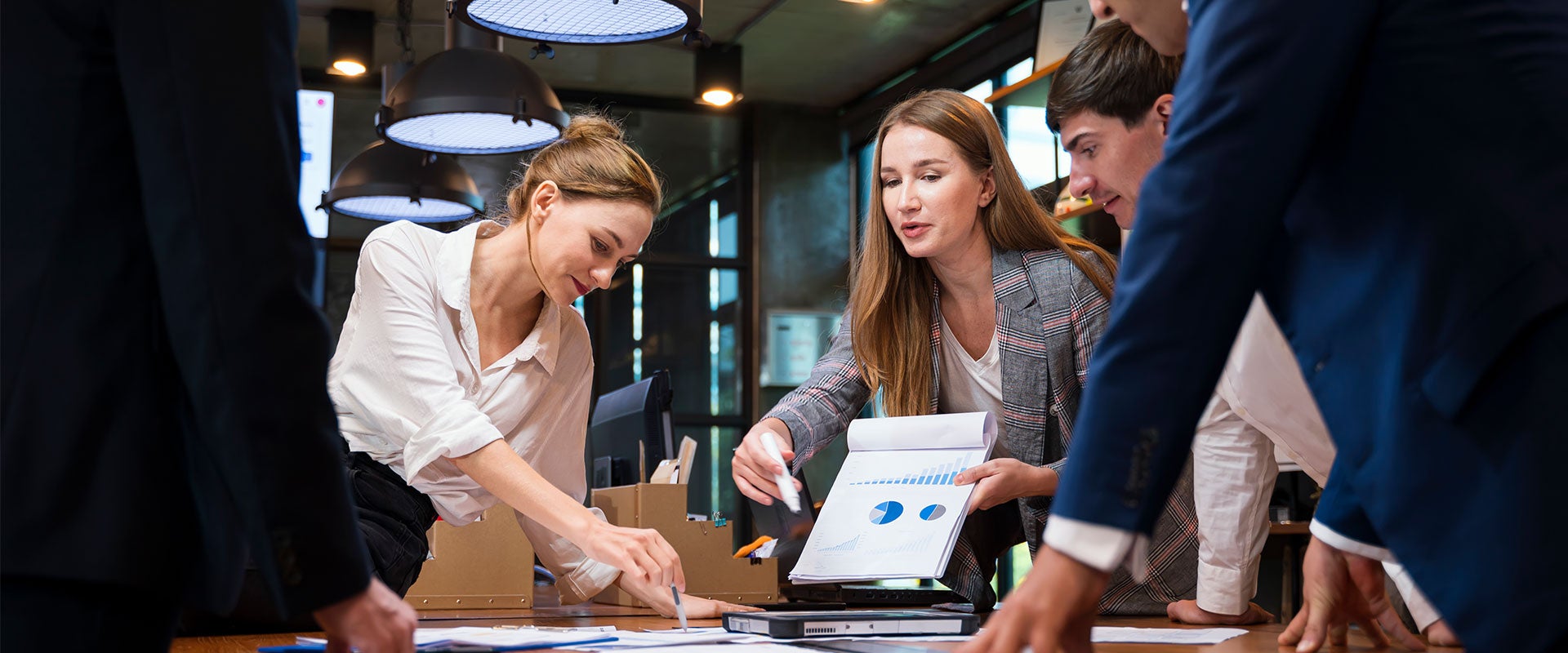 two women leading business meeting