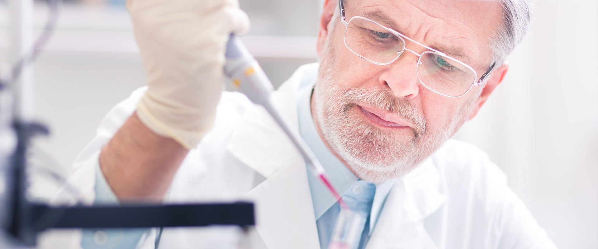 researcher using micropipettes