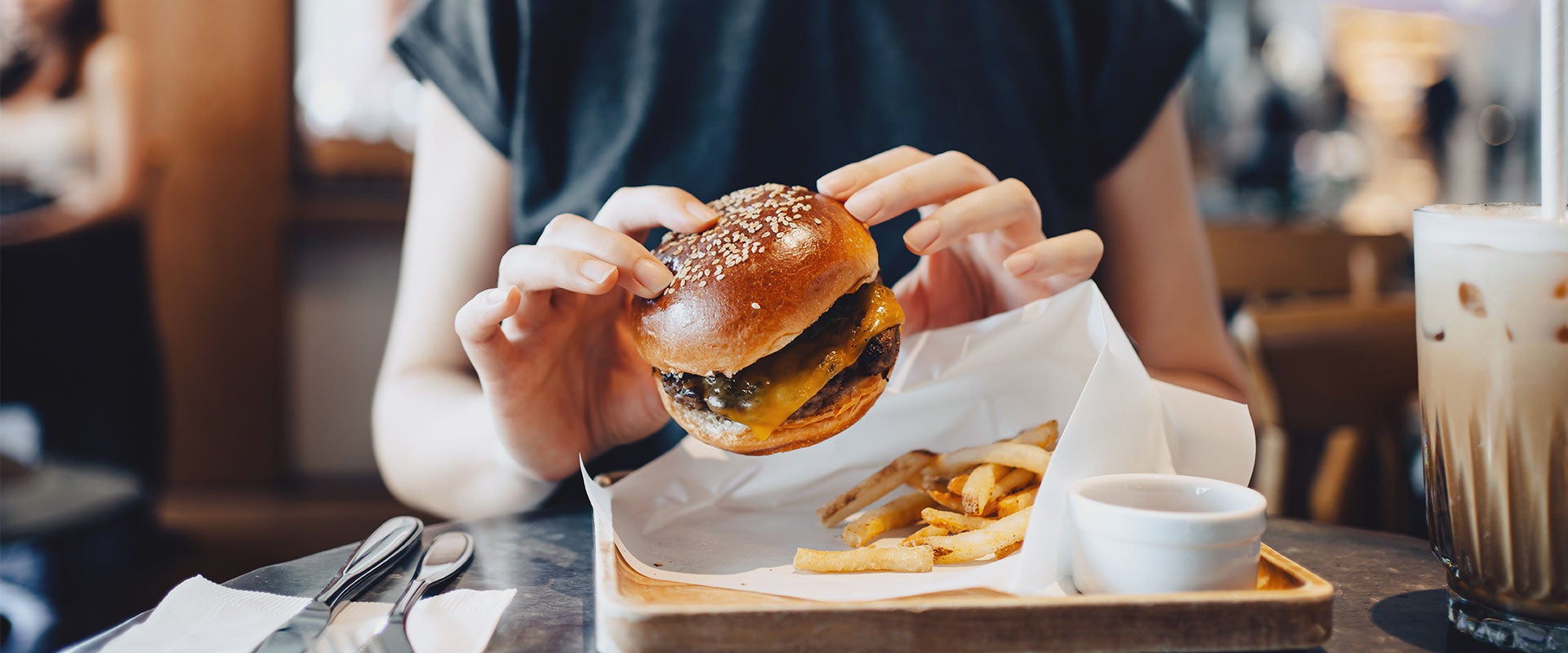 person holding hamburger