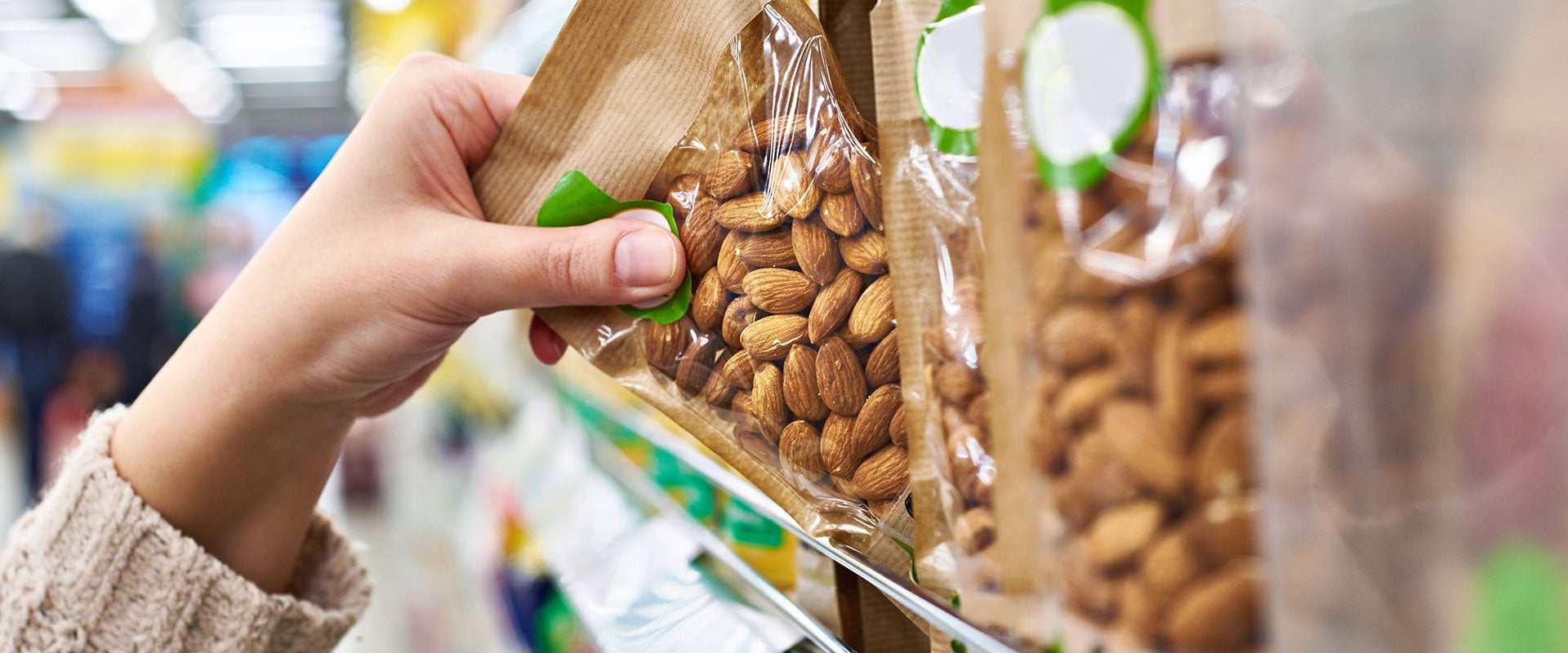 taking bag of almonds off shelf