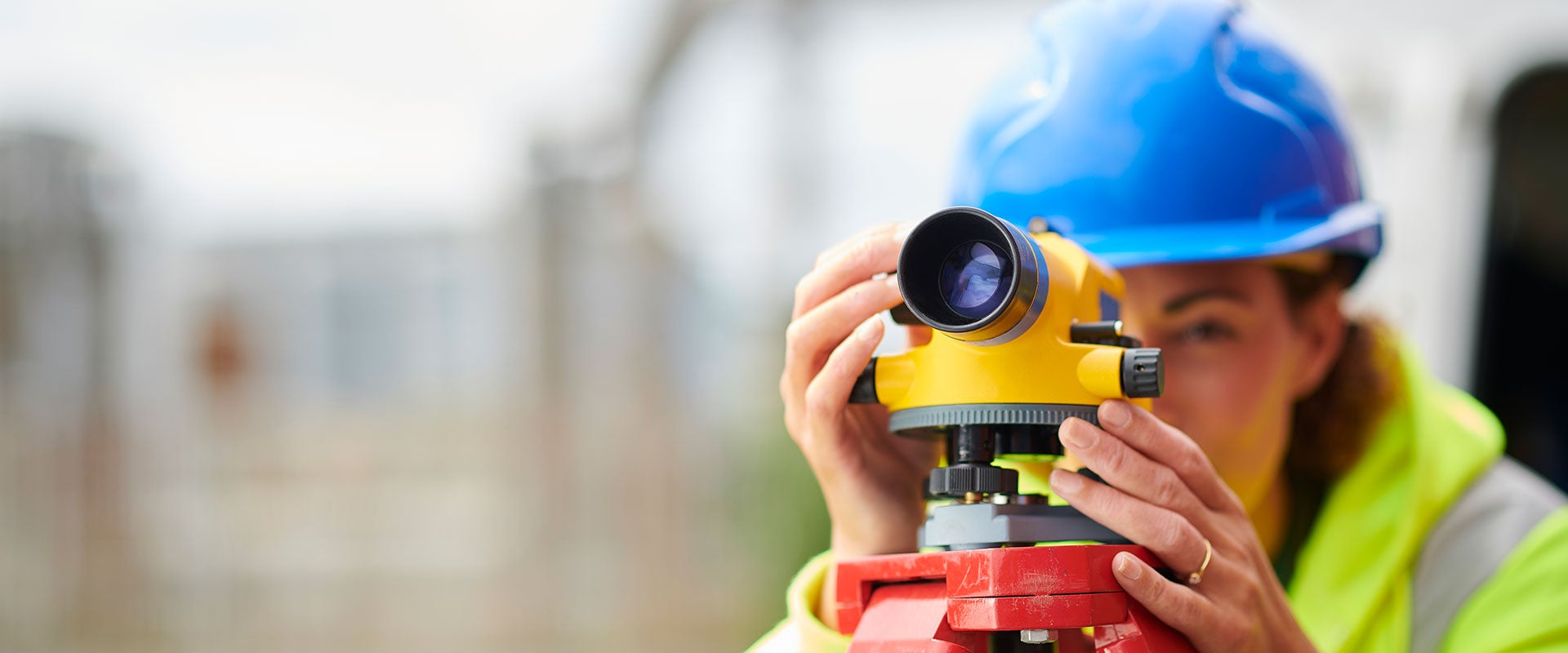 construction worker with leveling lens