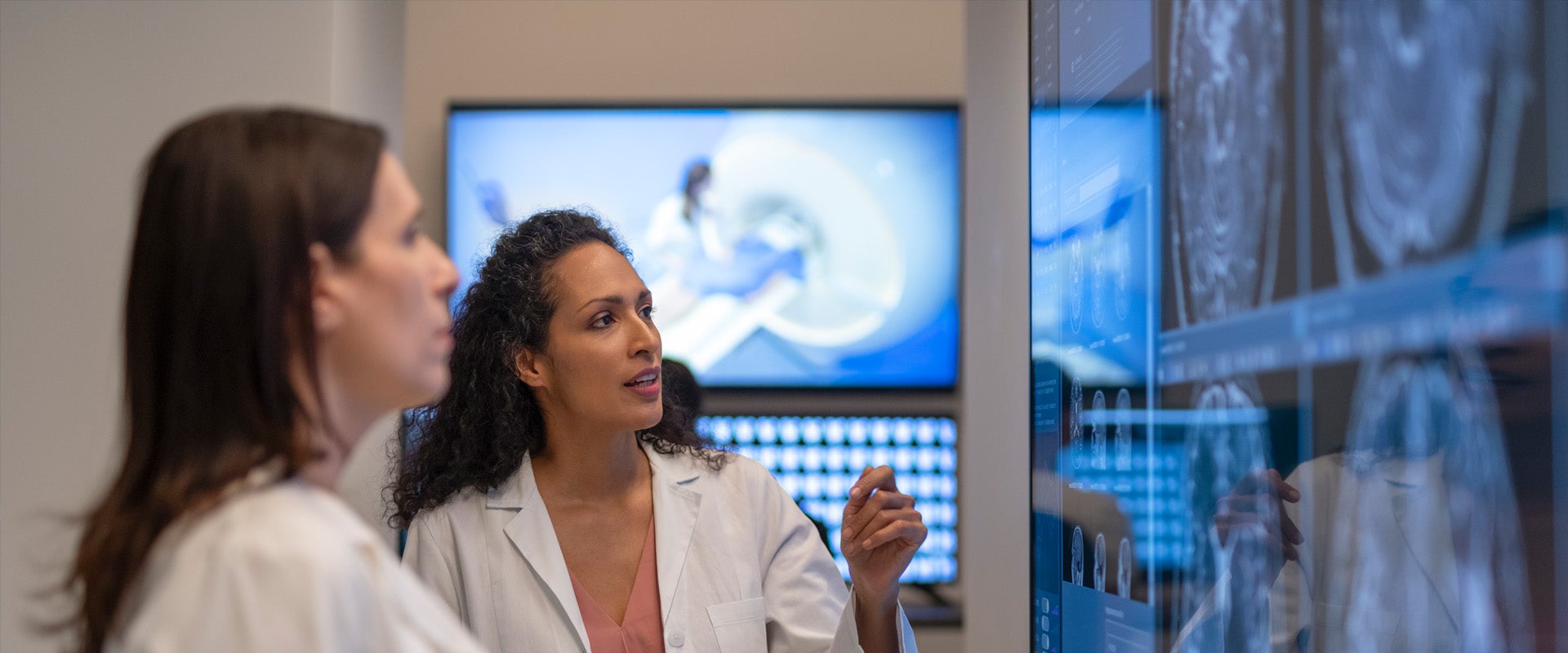 Two physicians reviewingxrays
