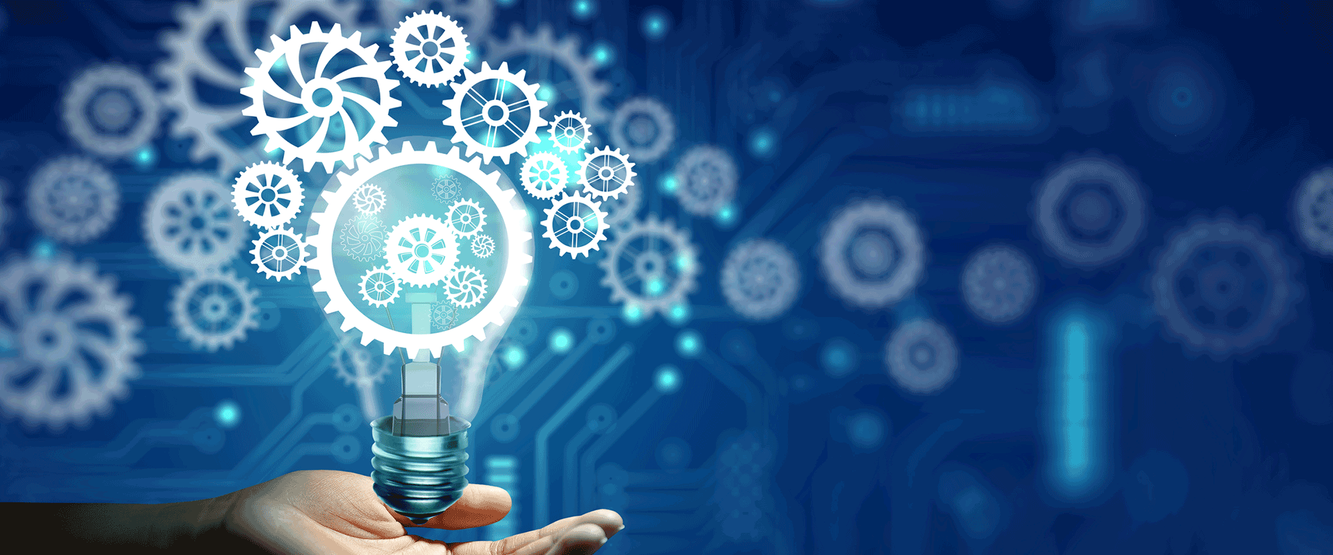abstract digital image of hand holding lightbulb with gears