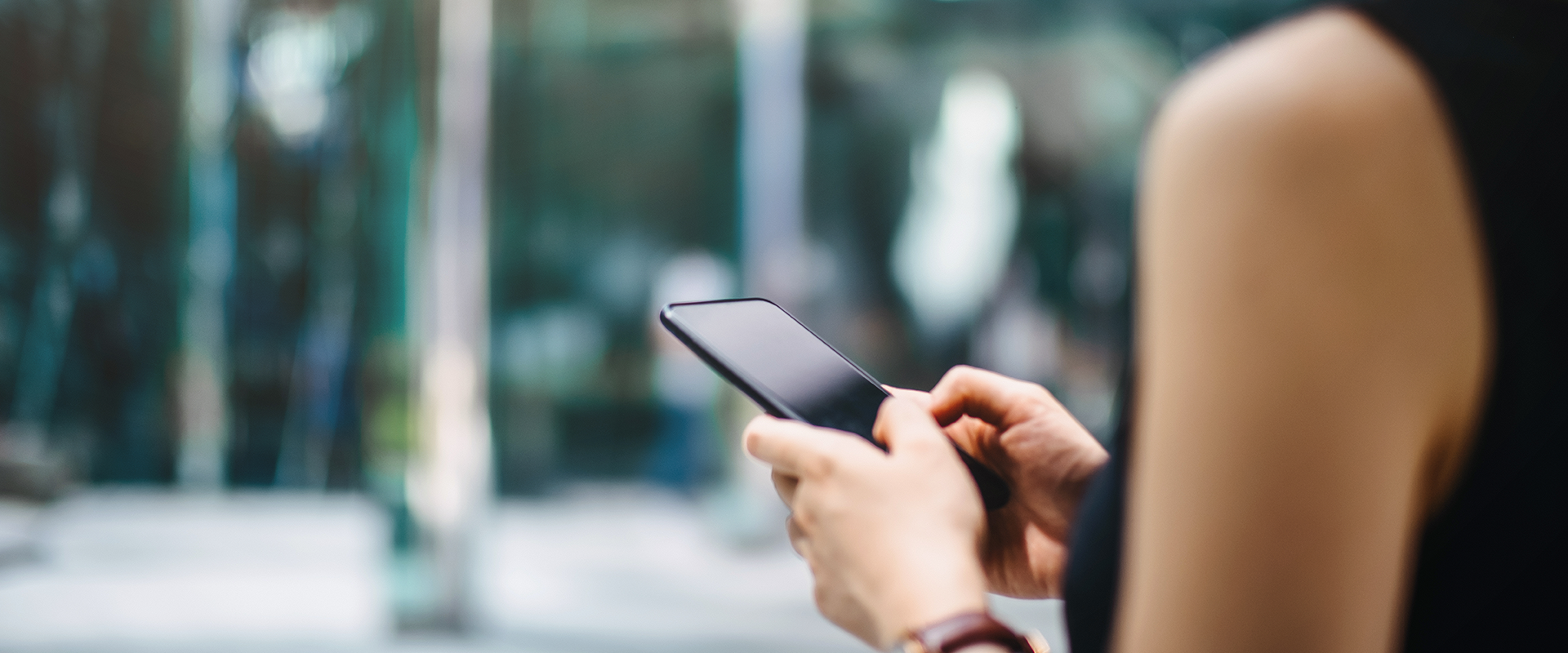 woman holding phone