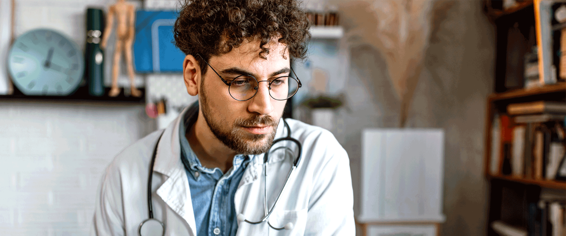 doctor looking at laptop