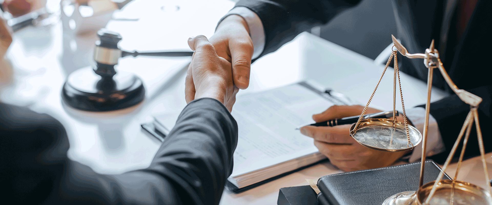 handshake in legal firm