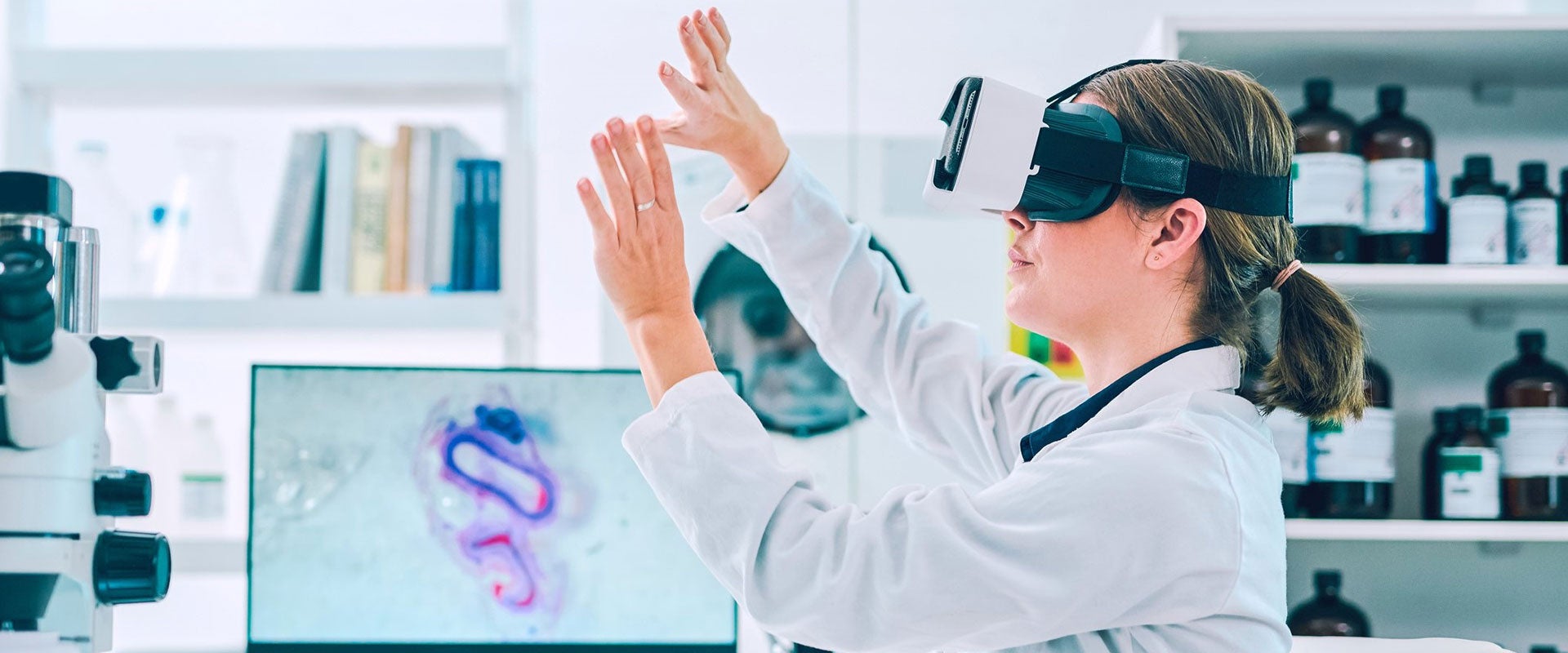 scientist wearing VR headset