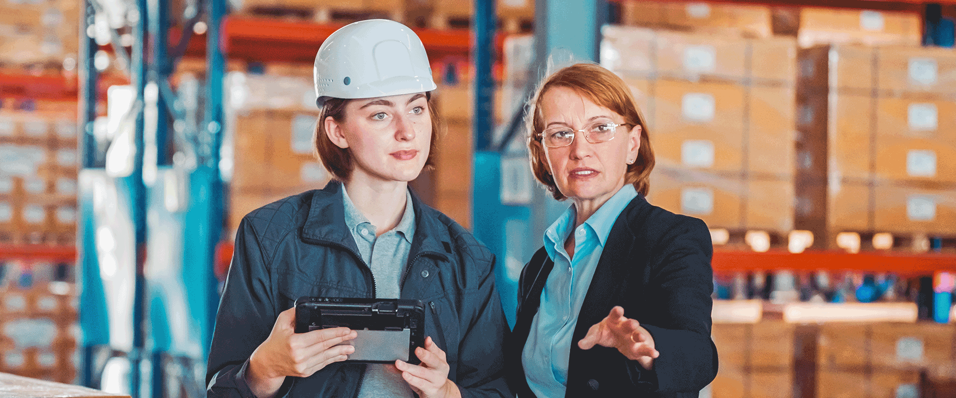 two women working in warehouse