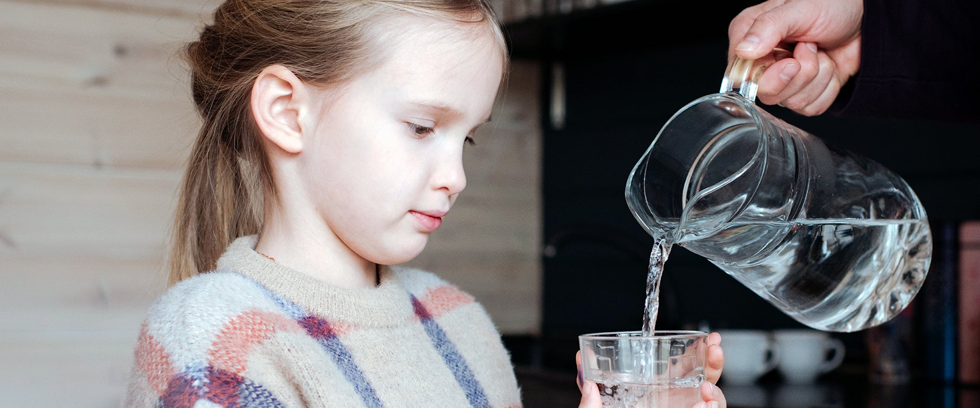 girl receiving water