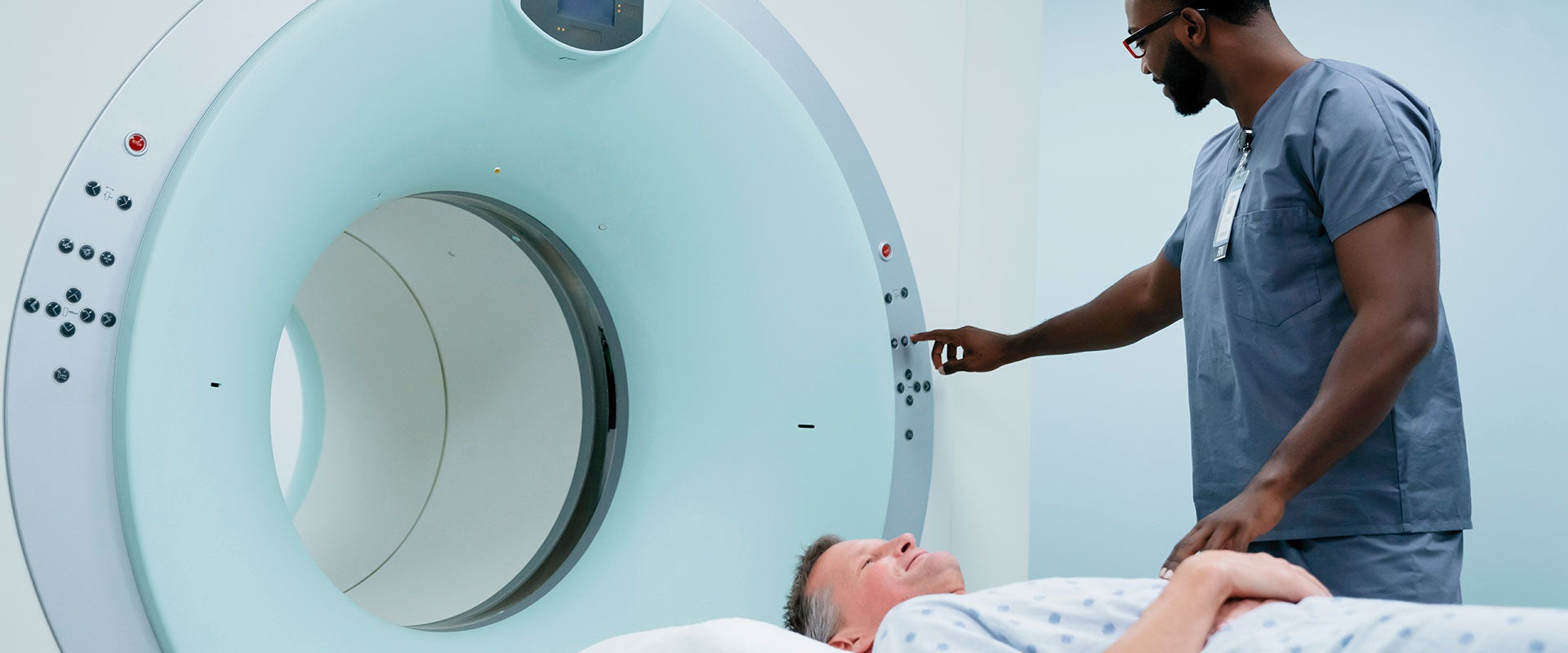 doctor and patient with MRI machine