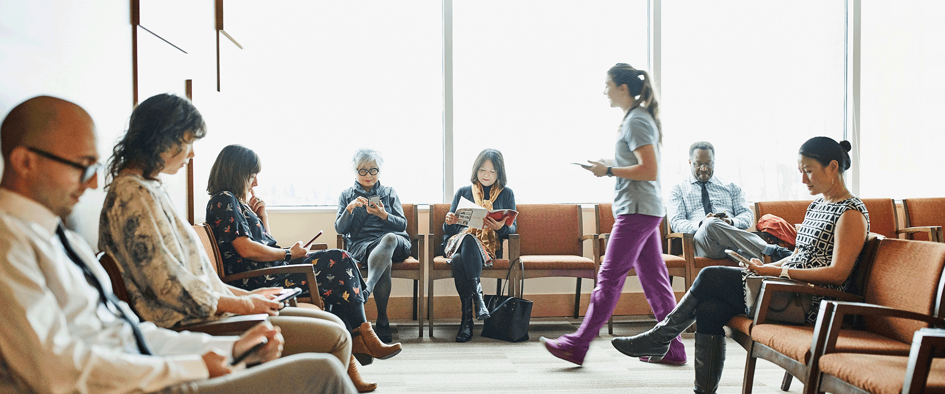 patients sitting in healthcare waiting room