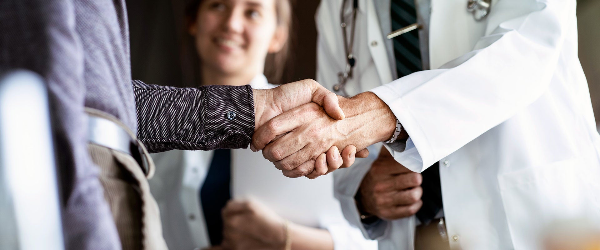 two people shaking hands