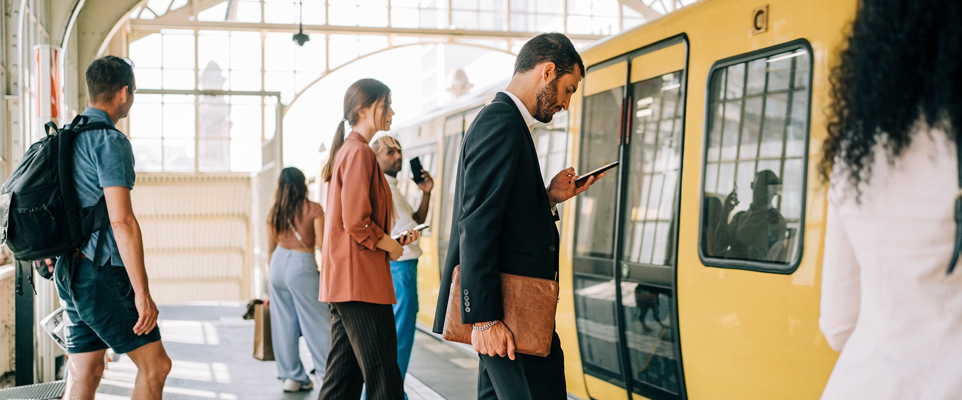 commuters walking onto train