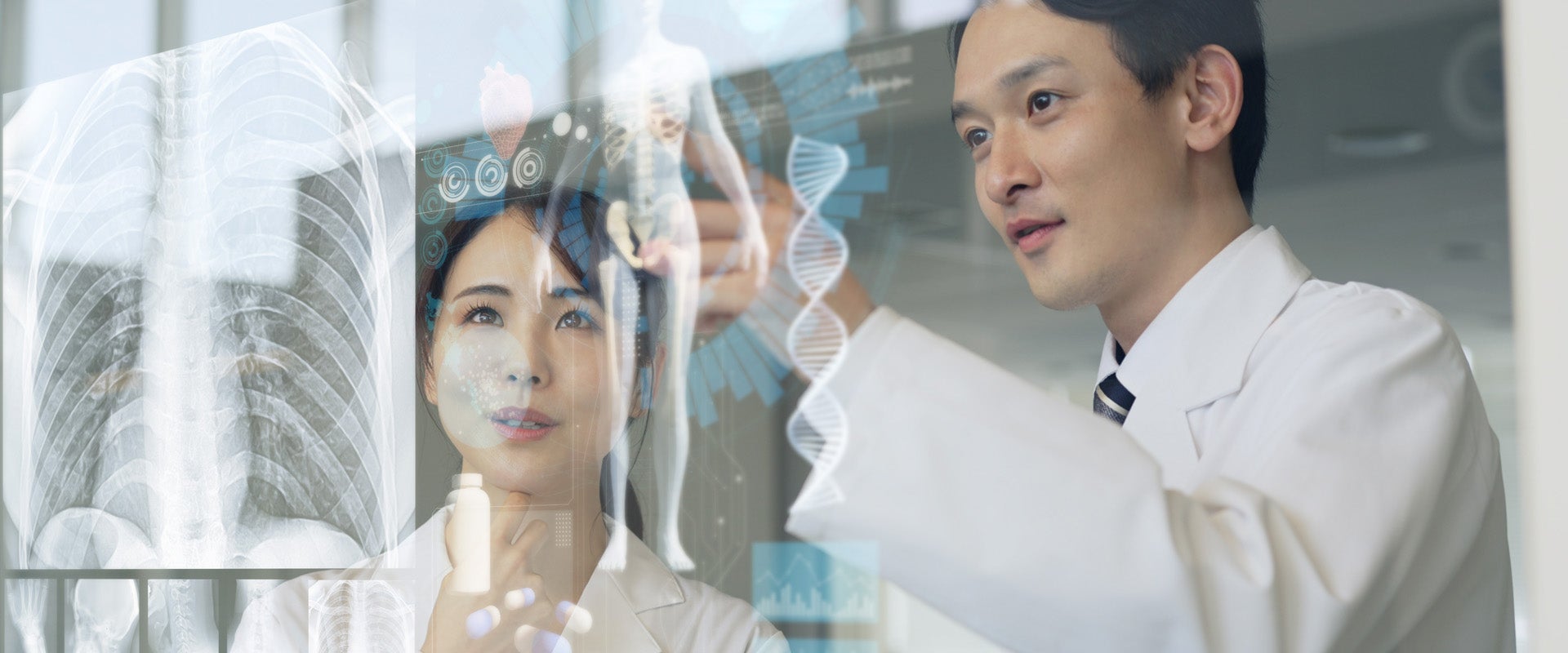 Two researchers studying xrays