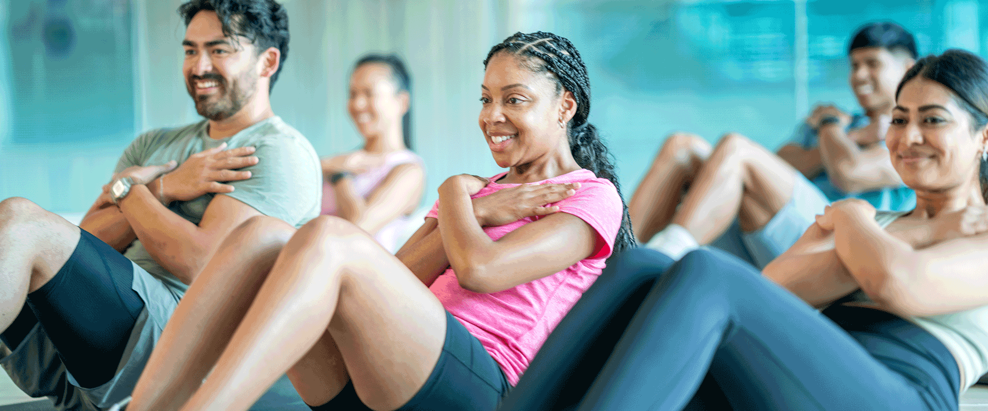 group of people in a workout class