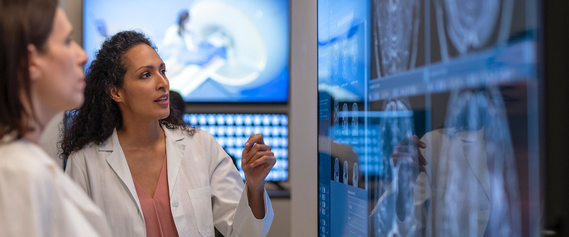 radiologists reviewing scans