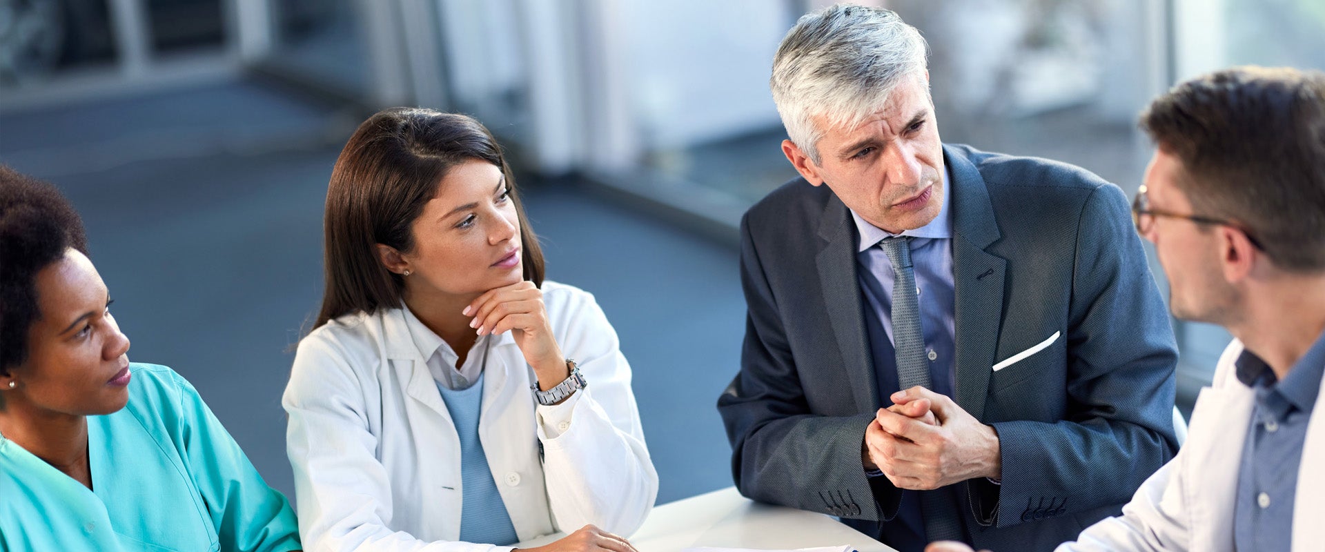 Healthcare executives meeting about healthcare issues