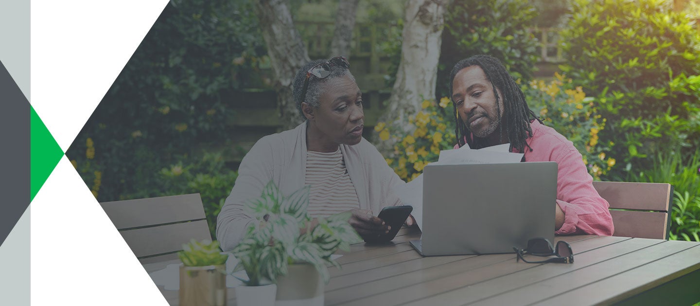 people looking at a computer together
