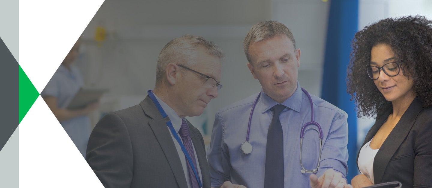 medical staff discussing documents
