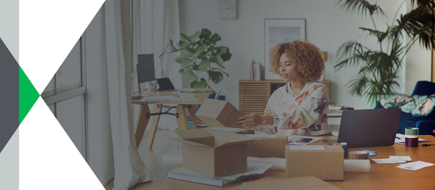 woman putting together boxes