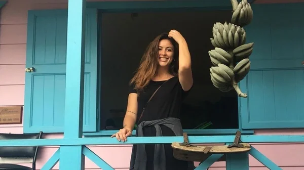 woman on colorful porch