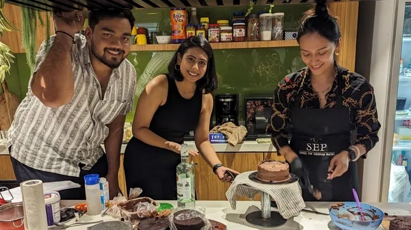 colleagues baking cake
